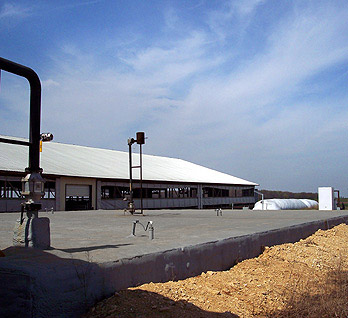 Exterior buildings and in-ground digester at Scheidairy Farms, IL