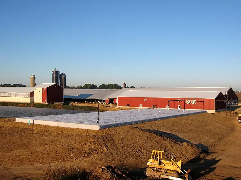 Exterior of Statz A Farm grounds, including in-ground digester and building